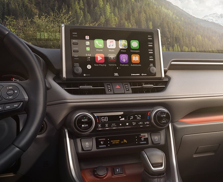 A Hybrid for Everyone at Fiore Toyota | the control screen of the toyota RAV4