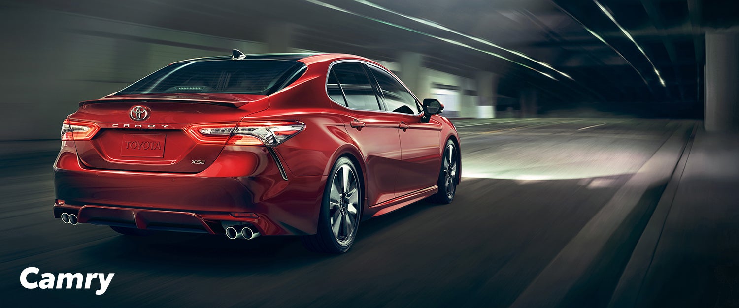Corolla versus Camry: Which Toyota sedan is right for you? | Red camry running on road