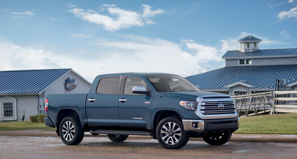 Comparison of the Toyota Tacoma vs. Tundra trucks at Fiore Toyota of Hollidaysburg | Toyota Tundra parked on road