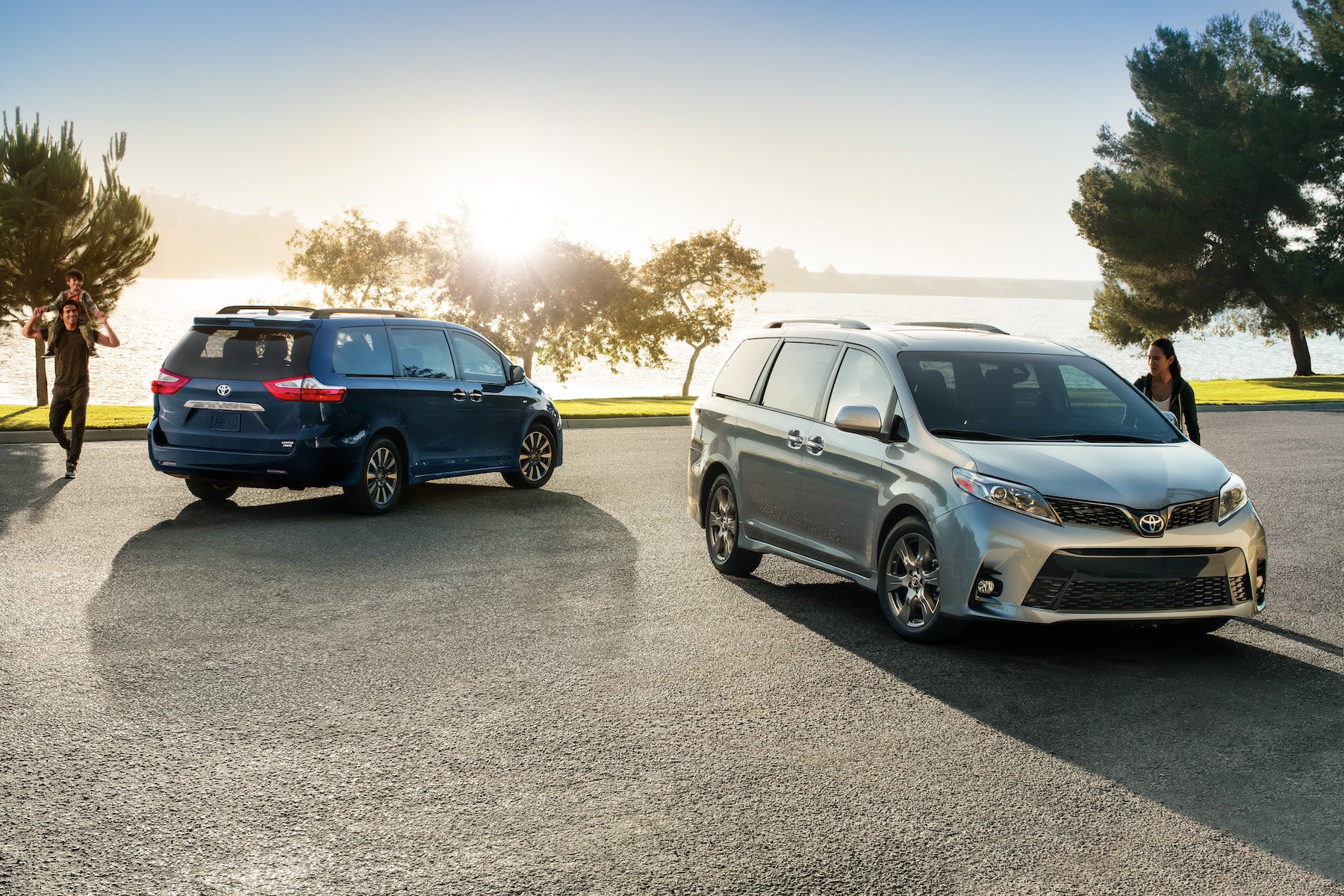 Compare the 2020 Toyota Sienna with the 2020 Honda Odyssey Fiore Toyota of Hollidaysburg | 2020 Sienna parked on the street