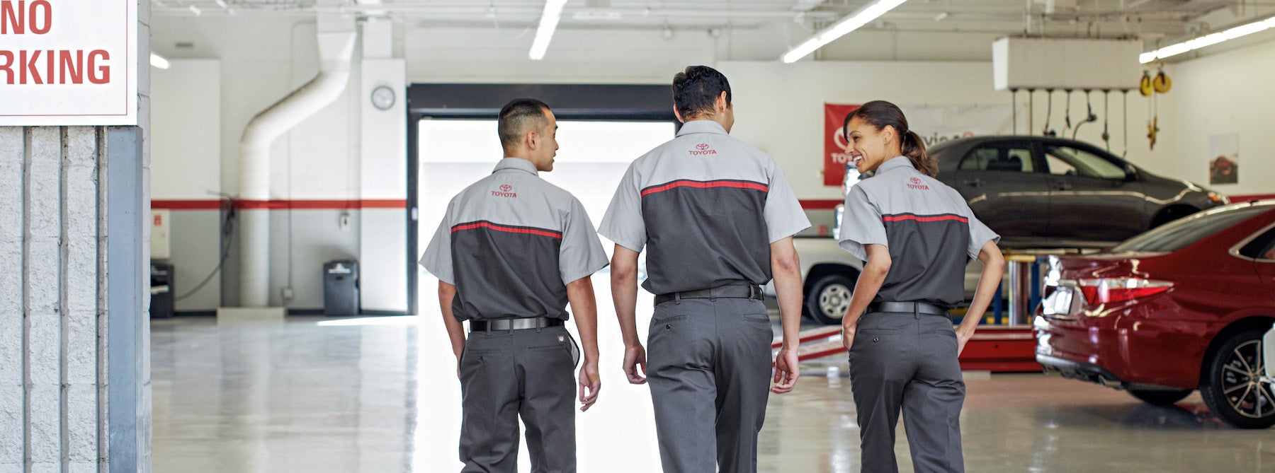 How to check your tires' health at Fiore Toyota of Hollidaysburg | Technician walkign towards toyota service center